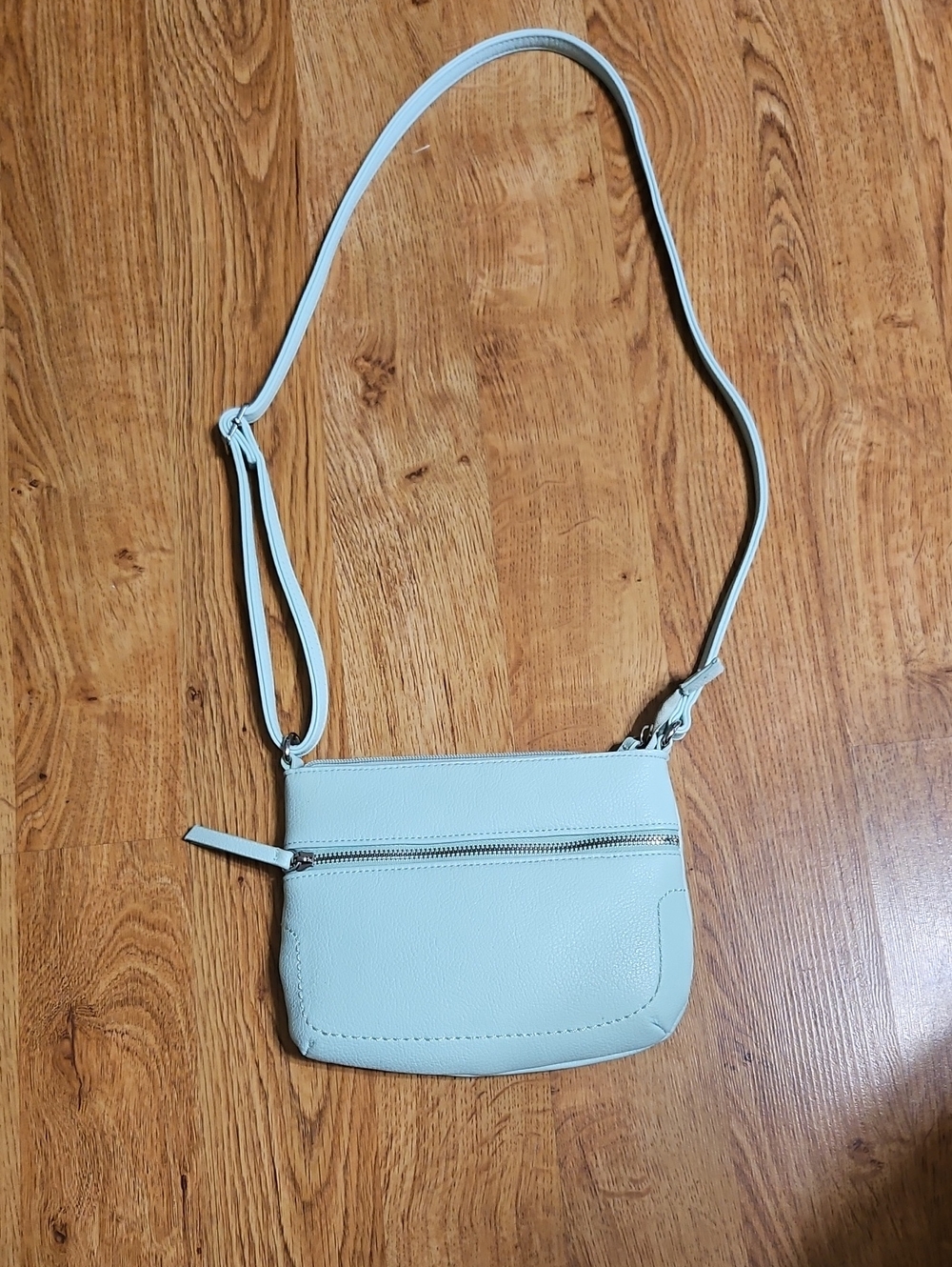 Compact Light Blue Crossbody Bag with Front Zip Pocket